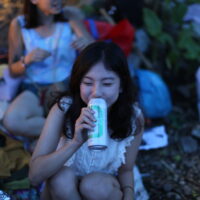 blowing a beer